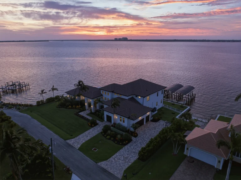 Aerial sunset over waterfront homes in Florida