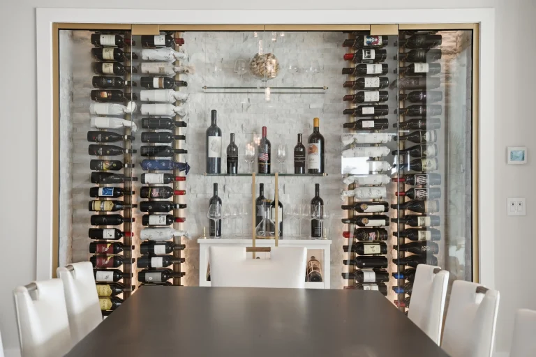 Glass-walled wine cellar beside the dining area