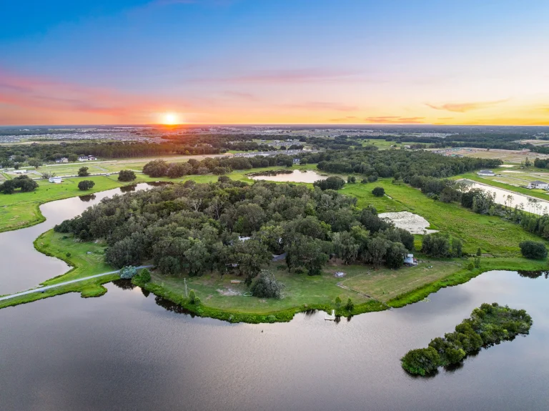 Drone sunset over a golf course and pond in Southwest Florida