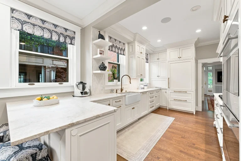 White kitchen with glass-front cabinets
