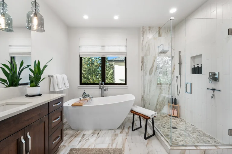 Bathroom with freestanding tub and glass shower