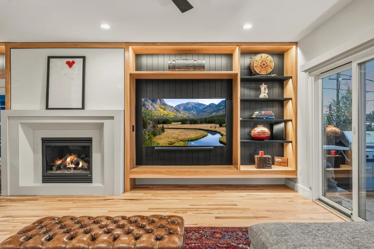 Living room with fireplace and built-in media wall